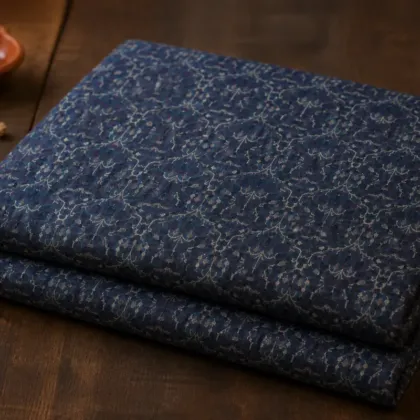 KashiFab Banarasi Fancy Yarn Viscose Jacquard folded on table - Banaras fabric cover