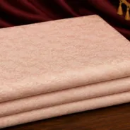 KashiFab Banarasi Fancy Yarn Viscose Jacquard folded on table - Banaras fabric cover