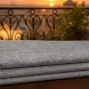 KashiFab Banarasi Fancy Yarn Viscose Jacquard folded on table - Banaras fabric cover