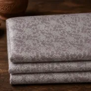 KashiFab Banarasi Fancy Yarn Viscose Jacquard folded on table - Banaras fabric cover