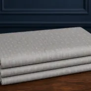 KashiFab Banarasi Fancy Yarn Viscose Jacquard folded on table - Banaras fabric cover