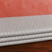 KashiFab Banarasi Fancy Yarn Viscose Jacquard folded on table - Banaras fabric cover