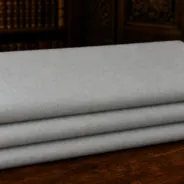 KashiFab Banarasi Fancy Yarn Viscose Jacquard folded on table - Banaras fabric cover