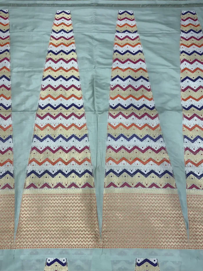 Mint Green Banarasi Silk Unstitched Lehenga with Multicolour Chevron Zari Panels KashiFab Mint Green Banarasi Silk Unstitched Lehenga with Multicolour Chevron Zari Panels